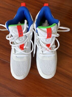 Under Armour Kids White Sneakers with Blue Lining and Neon Orange Accents